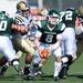 Eastern Michigan junior Alex Gillett looks to hand off the ball during the first quarter against Western Michigan at Rynearson Stadium on Saturday afternoon. Melanie Maxwell I AnnArbor.com